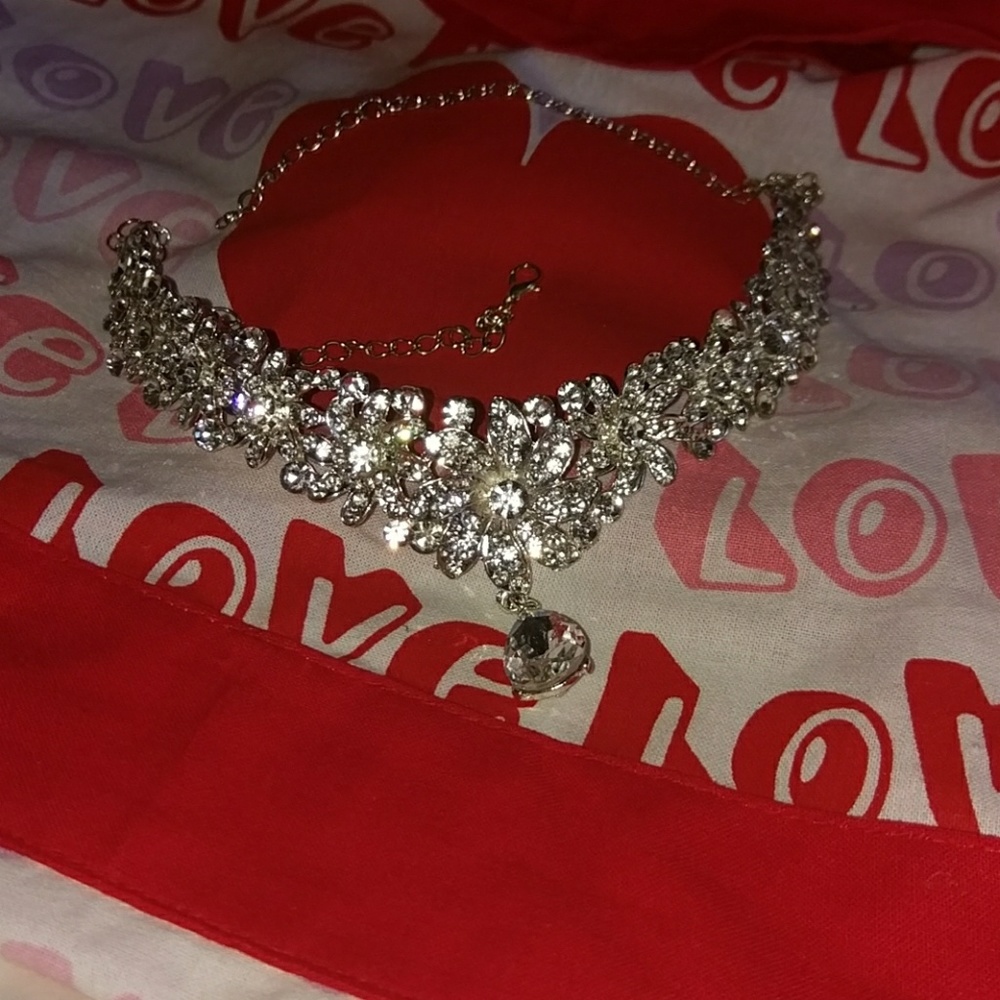 Sparkling Rhinestone neck piece.